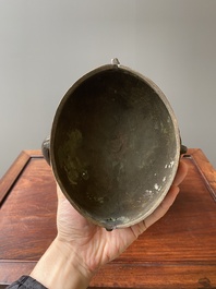 A Chinese archaic bronze ritual wine vessel and cover in Western Zhou-style, 'you', Ming