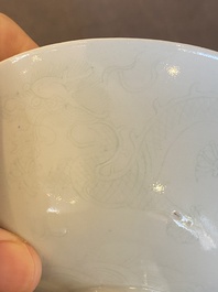 A Chinese monochrome white-glazed stem cup with anhua dragon design, Qianlong mark, 18/19th C.