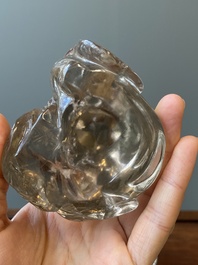 Two Chinese rock crystal sculptures of a sage with a turtle and of a Buddhist lion, 19th C.