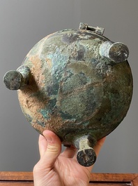 A Chinese archaic bronze tripod vessel and cover, 'ding', Eastern Zhou, Spring and Autumn period