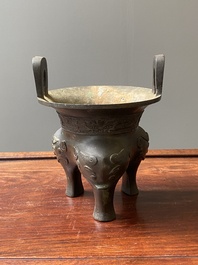 A Chinese archaic bronze tripod censer, 'ding', Ming