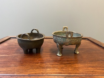 Two Chinese ritual bronze tripod food vessels, 'ding', Western Zhou and Yuan