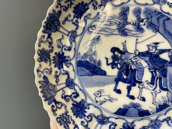 Three Japanese blue and white 'Mongolian hunt' plates in Chinese Kangxi-style, Edo, 18th C.