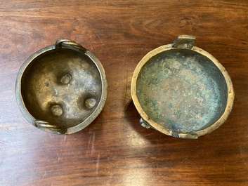 Two Chinese ritual bronze tripod food vessels, 'ding', Western Zhou and Yuan