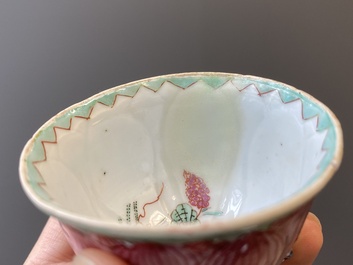 A pair of Chinese relief-decorated famille rose 'lotus' cups and saucers with a scholar and his servant, Yongzheng