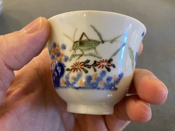 A pair of Chinese famille verte 'grasshopper' teacups, Kangxi mark but probably later