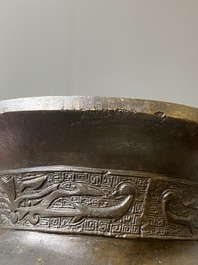 A Chinese archaic bronze tripod censer, 'ding', Ming