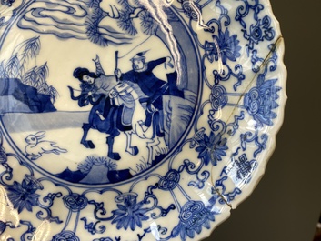 Three Japanese blue and white 'Mongolian hunt' plates in Chinese Kangxi-style, Edo, 18th C.