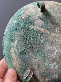 A Chinese archaic bronze tripod vessel and cover, 'ding', Eastern Zhou, Spring and Autumn period