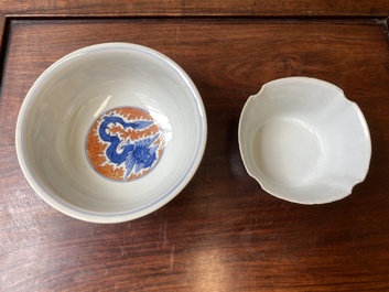 A Chinese blue, white and iron-red 'dragon' bowl and a famille rose 'immortals' bowl, Jiaqing and Wanli mark, 19th C.