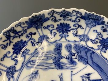 Three Japanese blue and white 'Mongolian hunt' plates in Chinese Kangxi-style, Edo, 18th C.