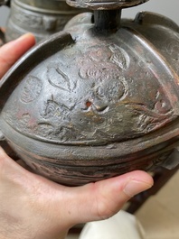 A Chinese archaic bronze ritual wine vessel and cover in Western Zhou-style, 'you', Ming