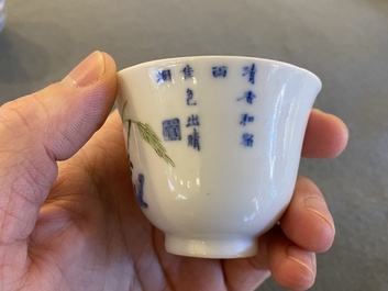 A pair of Chinese famille verte 'grasshopper' teacups, Kangxi mark but probably later