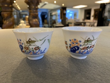 A pair of Chinese famille verte 'grasshopper' teacups, Kangxi mark but probably later