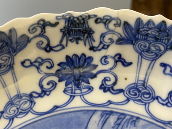 Three Japanese blue and white 'Mongolian hunt' plates in Chinese Kangxi-style, Edo, 18th C.