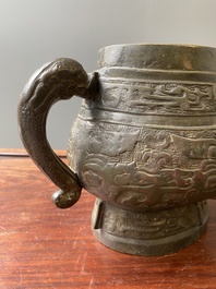 A Chinese archaic bronze ritual wine vessel and cover in Western Zhou-style, 'you', Ming