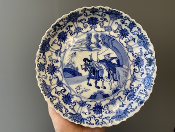 Three Japanese blue and white 'Mongolian hunt' plates in Chinese Kangxi-style, Edo, 18th C.