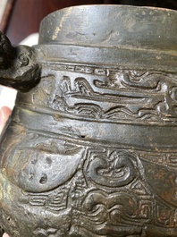 A Chinese archaic bronze ritual wine vessel and cover in Western Zhou-style, 'you', Ming