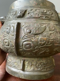 A Chinese archaic bronze ritual wine vessel and cover in Western Zhou-style, 'you', Ming