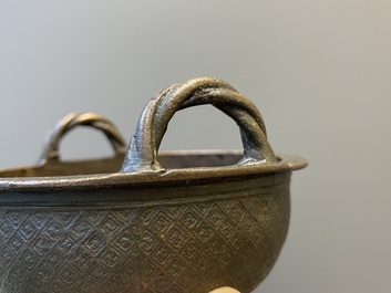 Two Chinese ritual bronze tripod food vessels, 'ding', Western Zhou and Yuan