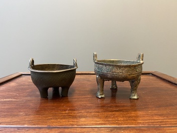 Two Chinese ritual bronze tripod food vessels, 'ding', Western Zhou and Yuan