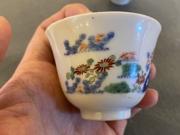 A pair of Chinese famille verte 'grasshopper' teacups, Kangxi mark but probably later