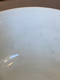 A Chinese monochrome white-glazed stem cup with anhua dragon design, Qianlong mark, 18/19th C.