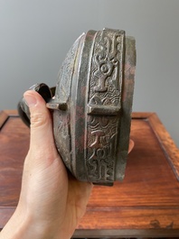 A Chinese archaic bronze ritual wine vessel and cover in Western Zhou-style, 'you', Ming