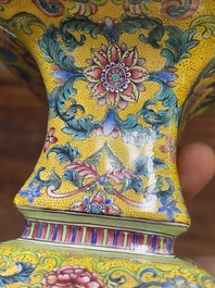 A Chinese yellow-ground Canton enamel 'European subject' vase, Qianlong mark and of the period