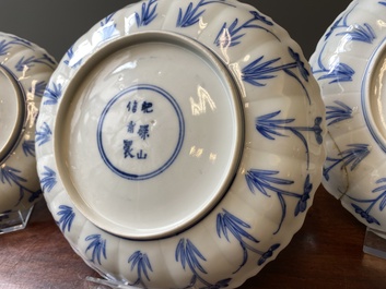 Three Japanese blue and white 'Mongolian hunt' plates in Chinese Kangxi-style, Edo, 18th C.