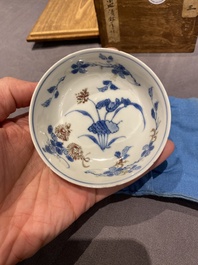 Five Chinese blue, white and copper-red semi-eggshell bowls, Xuande mark, Wanli