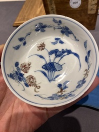 Five Chinese blue, white and copper-red semi-eggshell bowls, Xuande mark, Wanli