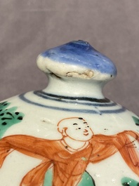 A Chinese wucai vase and cover with narrative design, Transitional period