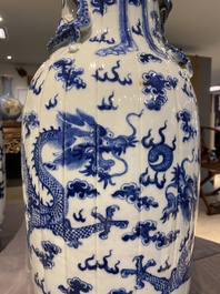 A pair of Chinese blue and white 'dragon' vases, 19th C.