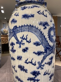 A pair of Chinese blue and white 'dragon' vases, 19th C.