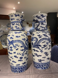 A pair of Chinese blue and white 'dragon' vases, 19th C.