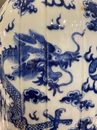 A pair of Chinese blue and white 'dragon' vases, 19th C.