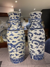 A pair of Chinese blue and white 'dragon' vases, 19th C.