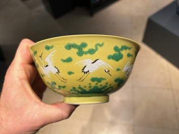 A Chinese yellow-ground 'cranes' bowl, Yongzheng mark and probably of the period