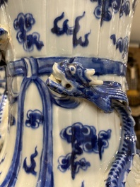 A pair of Chinese blue and white 'dragon' vases, 19th C.