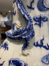 A pair of Chinese blue and white 'dragon' vases, 19th C.