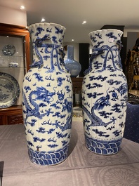 A pair of Chinese blue and white 'dragon' vases, 19th C.