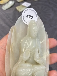 A Chinese white jade sculpture of Guanyin on a lotus throne, Qing