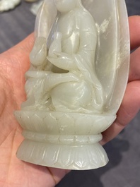 A Chinese white jade sculpture of Guanyin on a lotus throne, Qing