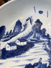 A Chinese blue and white dish with a scholar in a landscape, Yongzheng/Qianlong