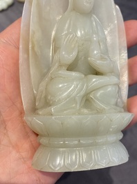 A Chinese white jade sculpture of Guanyin on a lotus throne, Qing