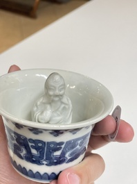 A Chinese blue and white trick cup, 'gong dao bei', 19th C.