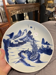 A Chinese blue and white dish with a scholar in a landscape, Yongzheng/Qianlong