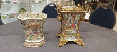 Two fine Chinese Canton famille rose flower holders, one with a gilt bronze mount, 19th C.