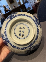 A Chinese blue and white 'Shou Lao' bowl with carved exterior, Chenghua mark, Wanli